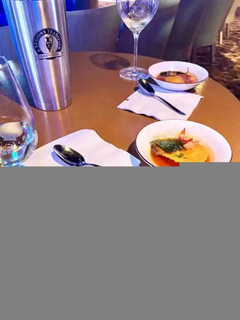 small plates and glasses of wine.