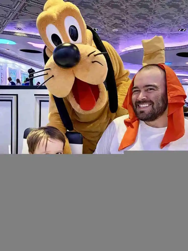Goofy at Disney Cruise breakfast with family.