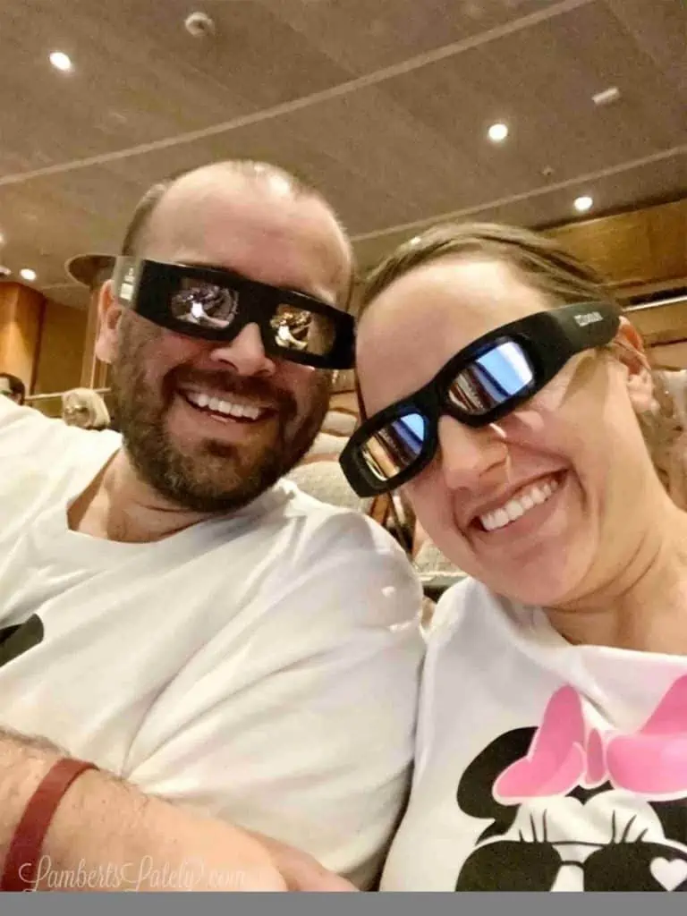 wearing 3d glasses at movie theater on the ship.