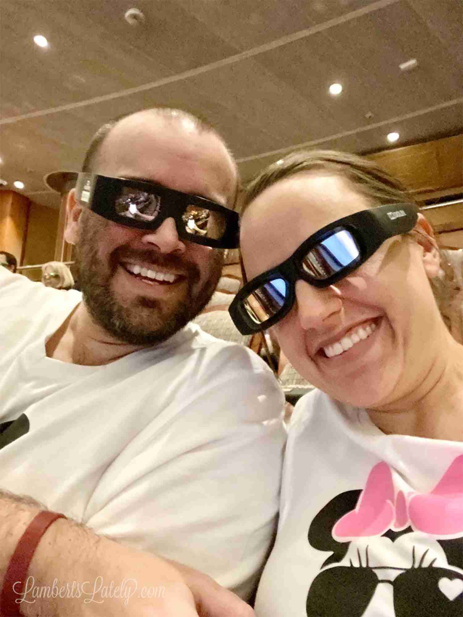 wearing 3d glasses at movie theater on the ship.