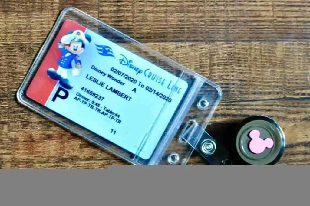 retractable card holder holding a disney cruise id.
