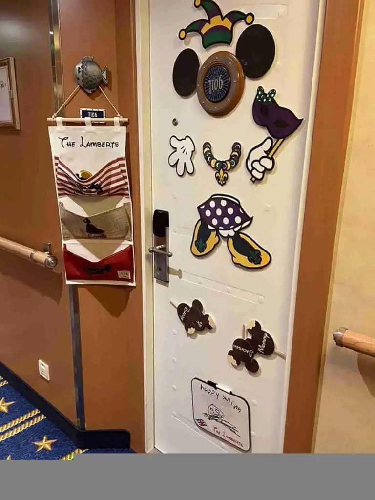 mardi gras minnie decorations on a disney cruise cabin door.