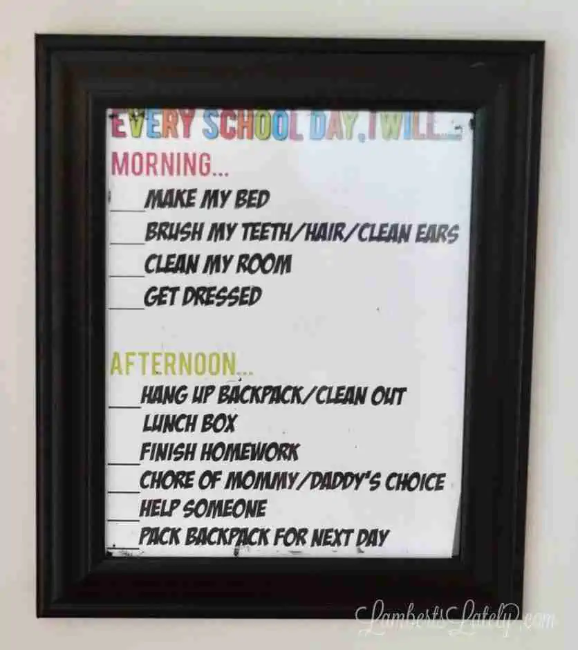 chore chart hung in a picture frame