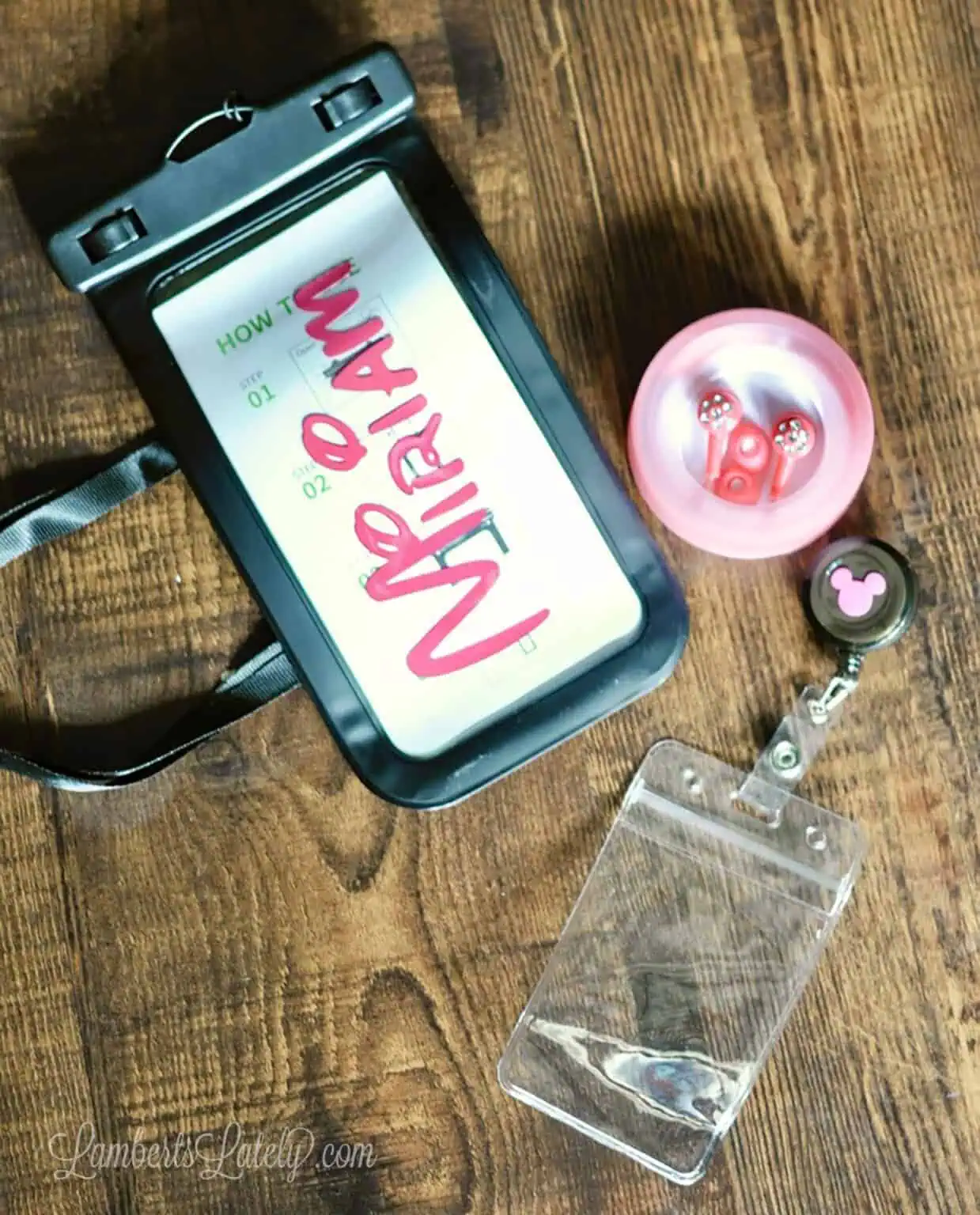 monogrammed phone case, ear buds, card holder.