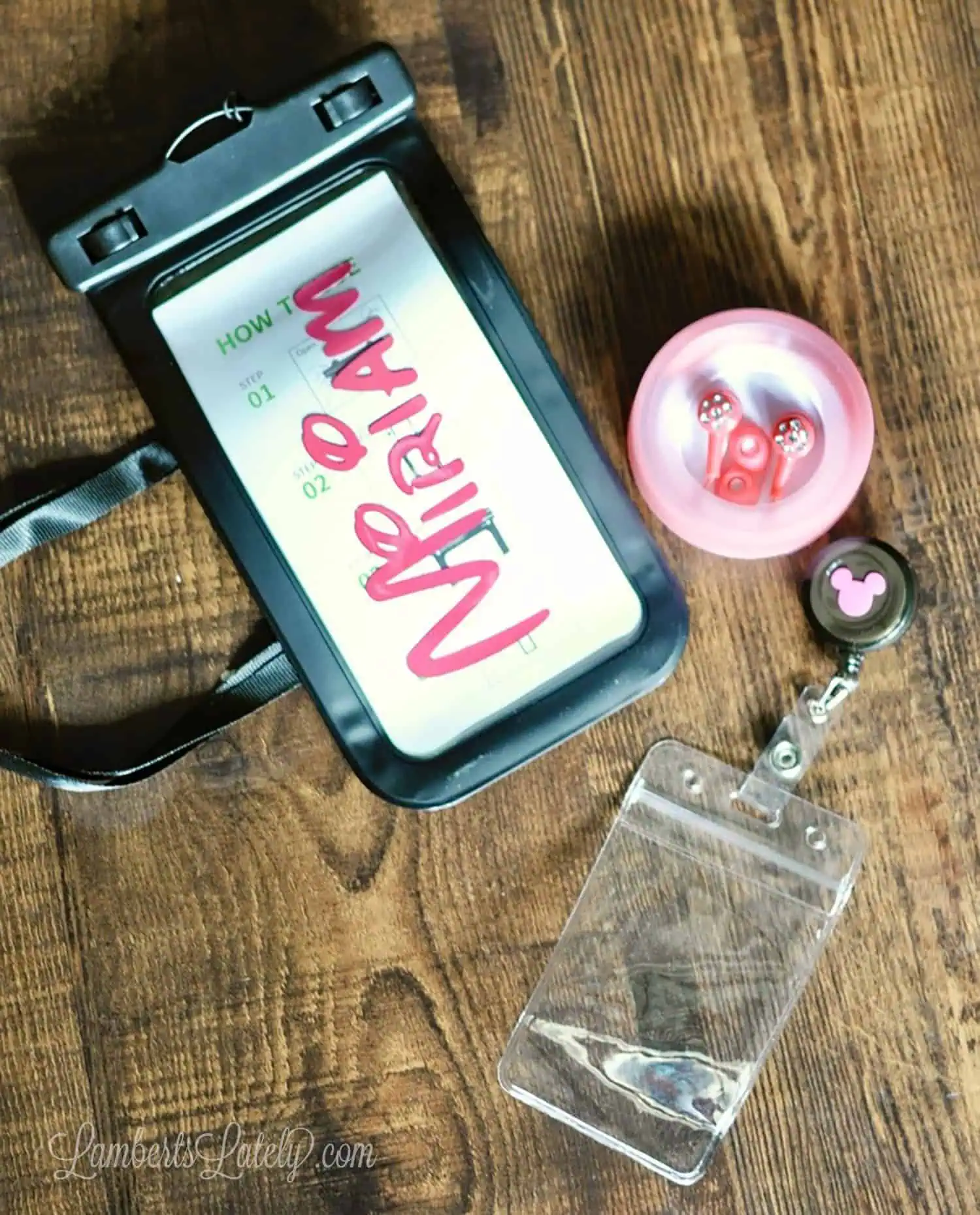 monogrammed phone case, ear buds, card holder.