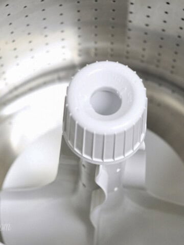 inside the clean drum of a top loading washing machine.