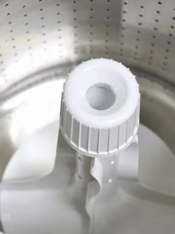 inside the clean drum of a top loading washing machine.