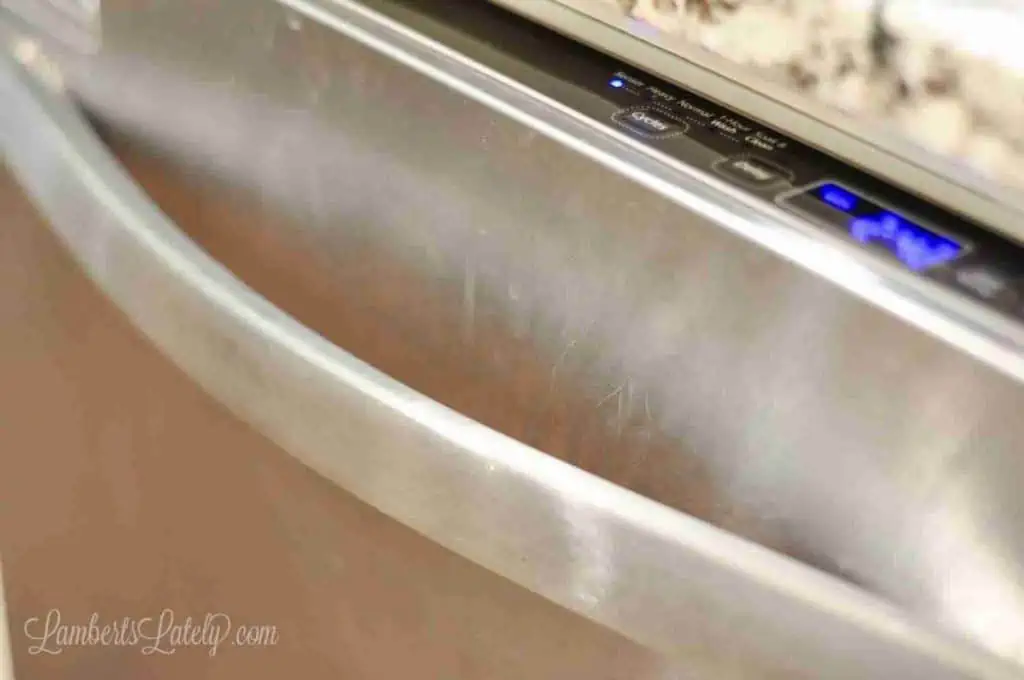 smudges and scratches on a stainless steel dishwasher