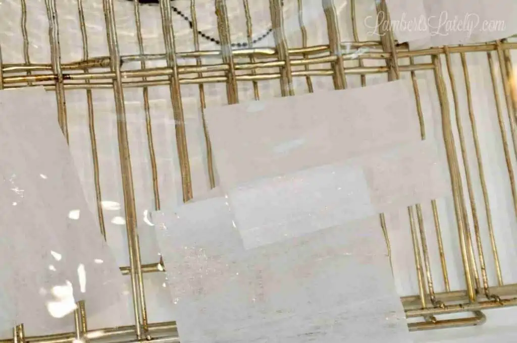 dryer sheets, hot water, and oven racks cleaning in a bathtub