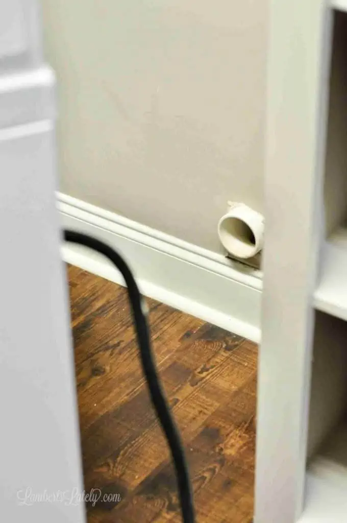 dryer vent hose disconnected from the wall