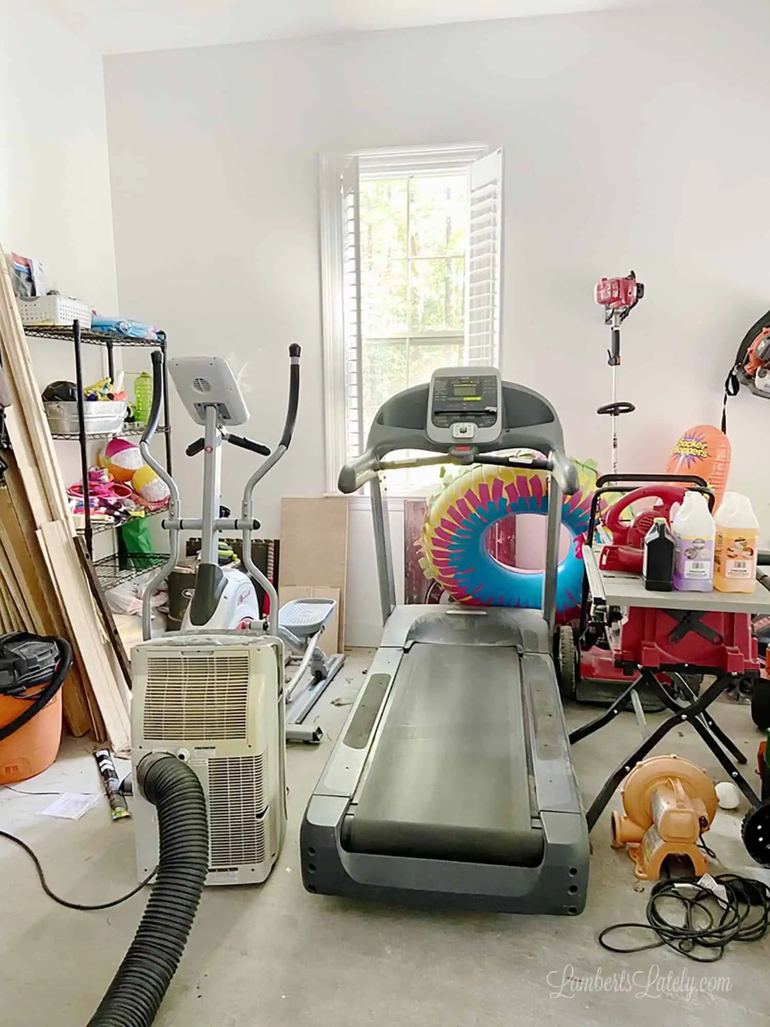 cluttered garage before cleaning and organizing.