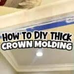 Applying faux crown molding for a DIY home decor project.