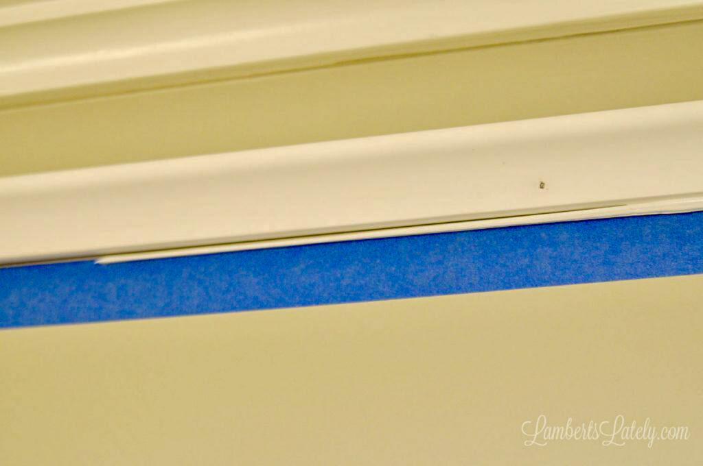small bead of caulk below crown molding piece.