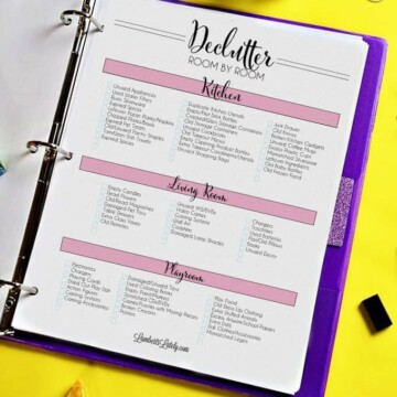 room by room declutter checklist pdf in a notebook.