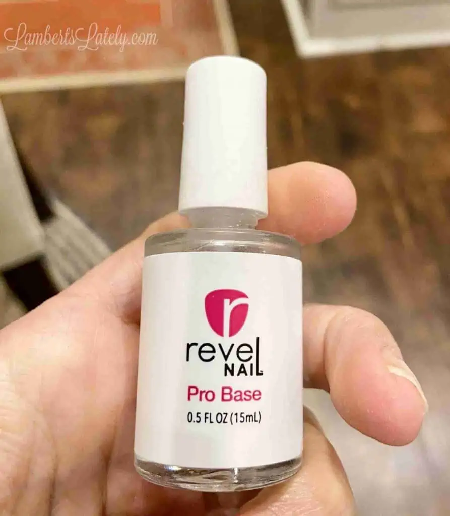 bottle of revel nail pro base.