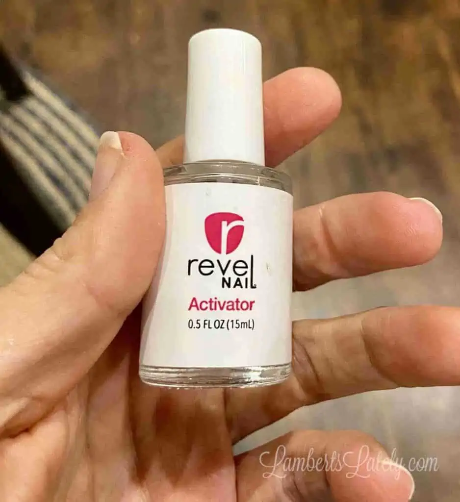 bottle of revel nail activator