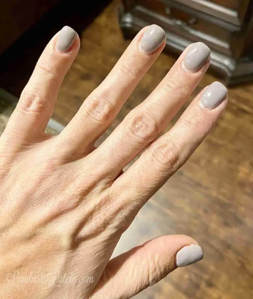 finished dip powder nails after one week of wear.