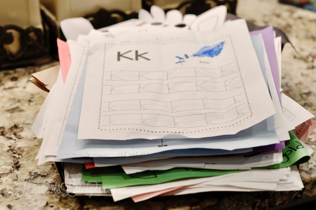 Build a home command center that works! This post includes organization strategies for keeping up with family papers, including school work and receipts - also shows how to digitally organize documents.