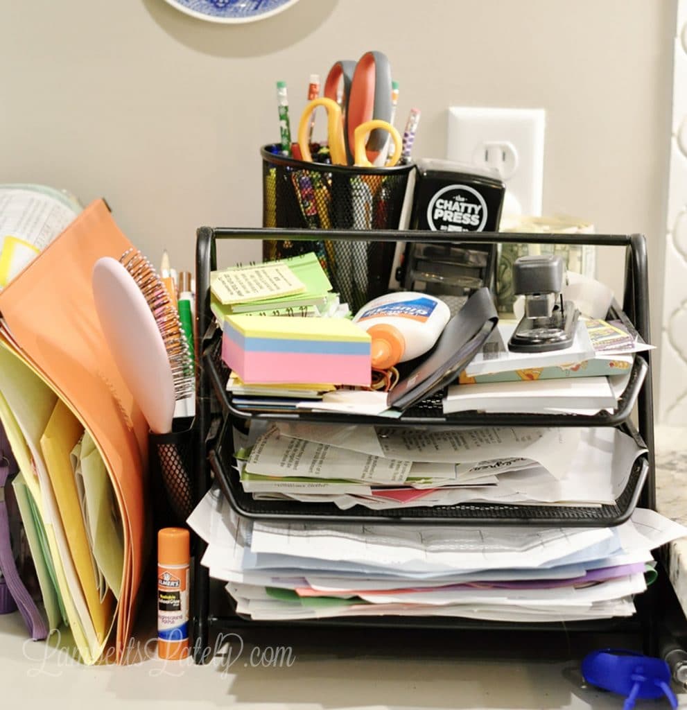 Build a home command center that works! This post includes organization strategies for keeping up with family papers, including school work and receipts - also shows how to digitally organize documents.