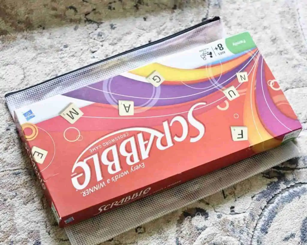 measuring board game filing bags with their boxes