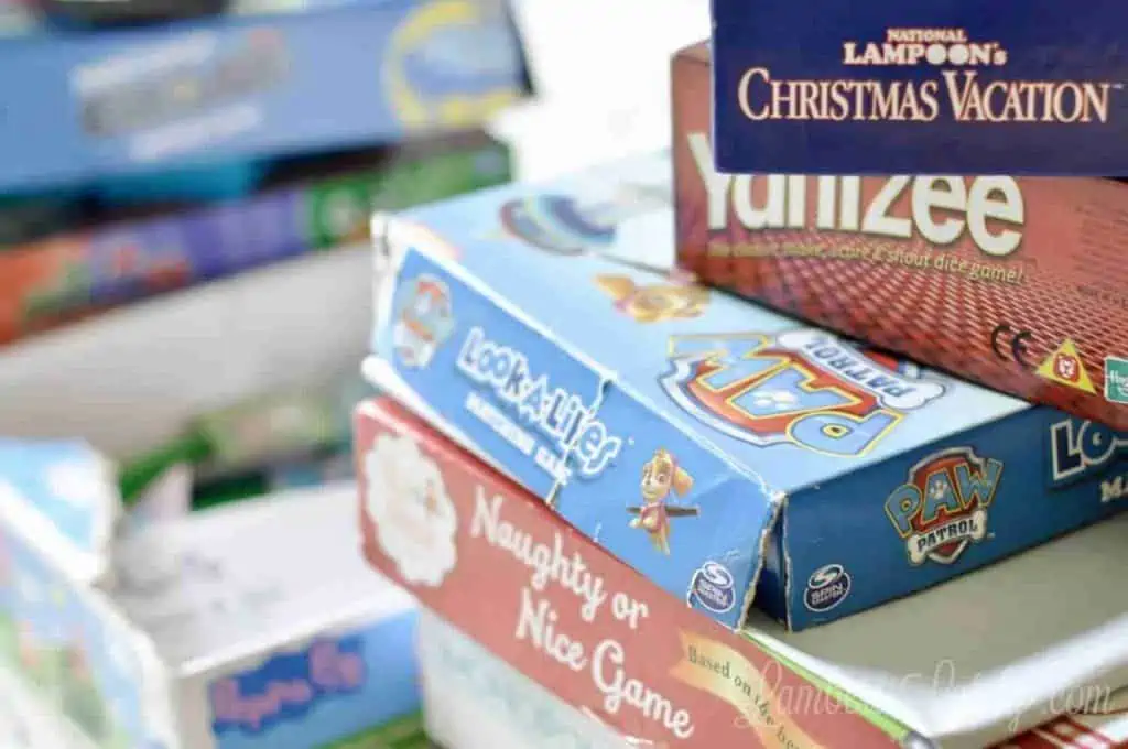 stack of old board game cardboard boxes