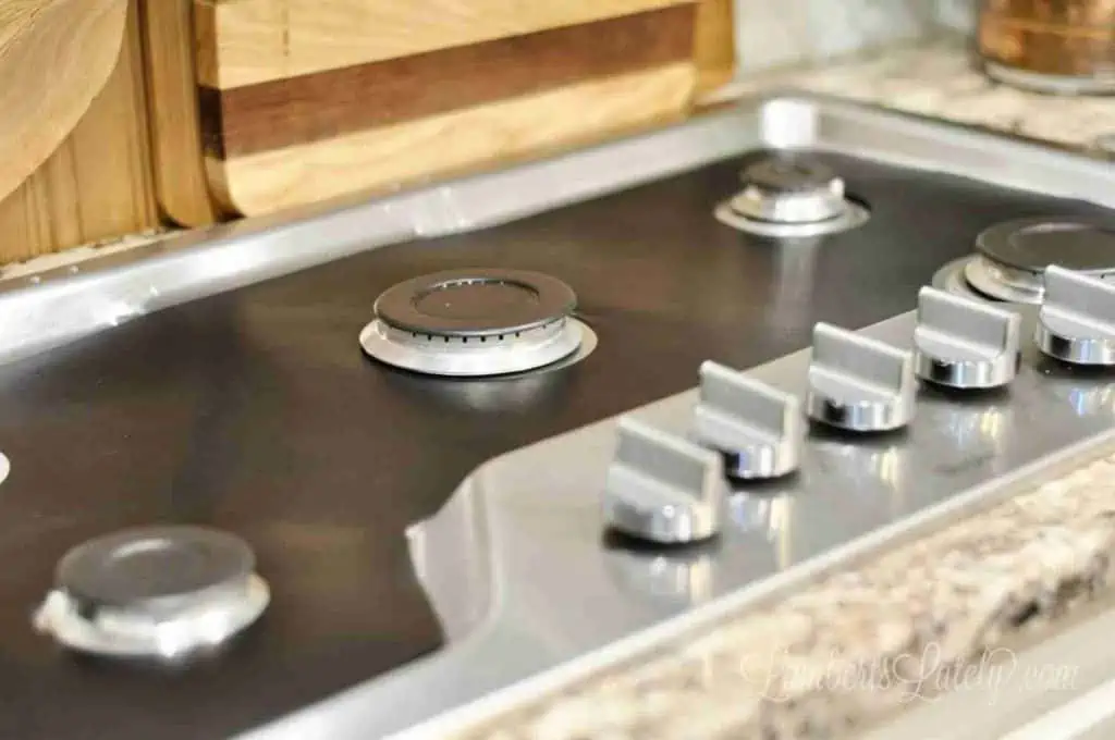 diy stove splatter guard on a stovetop