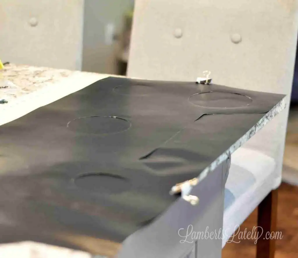 two pieces of oven liner fastened together