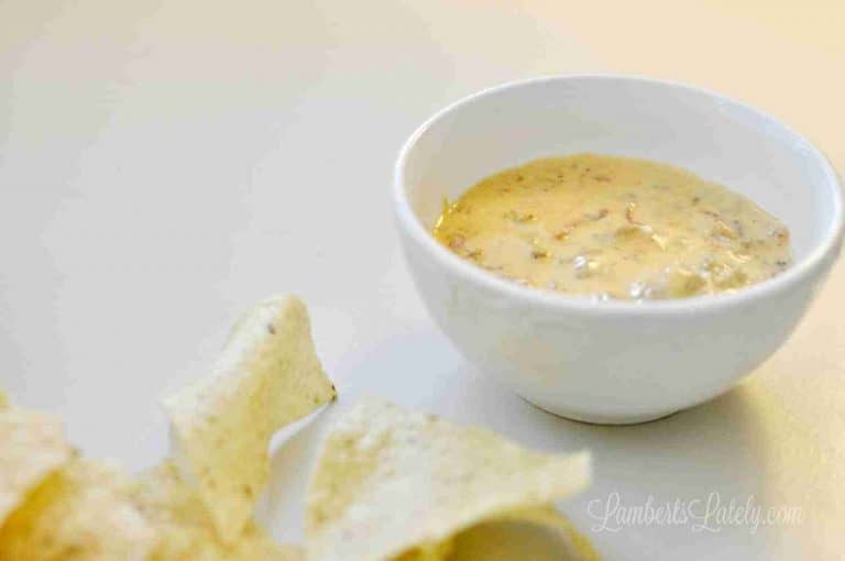 This recipe for Instant Pot Sausage Rotel Dip uses Velveeta, Rotel, cream cheese, and hot breakfast sausage to make an out-of-this-world tailgate appetizer that everyone will love! Can also sub ground beef or chicken for the meat.