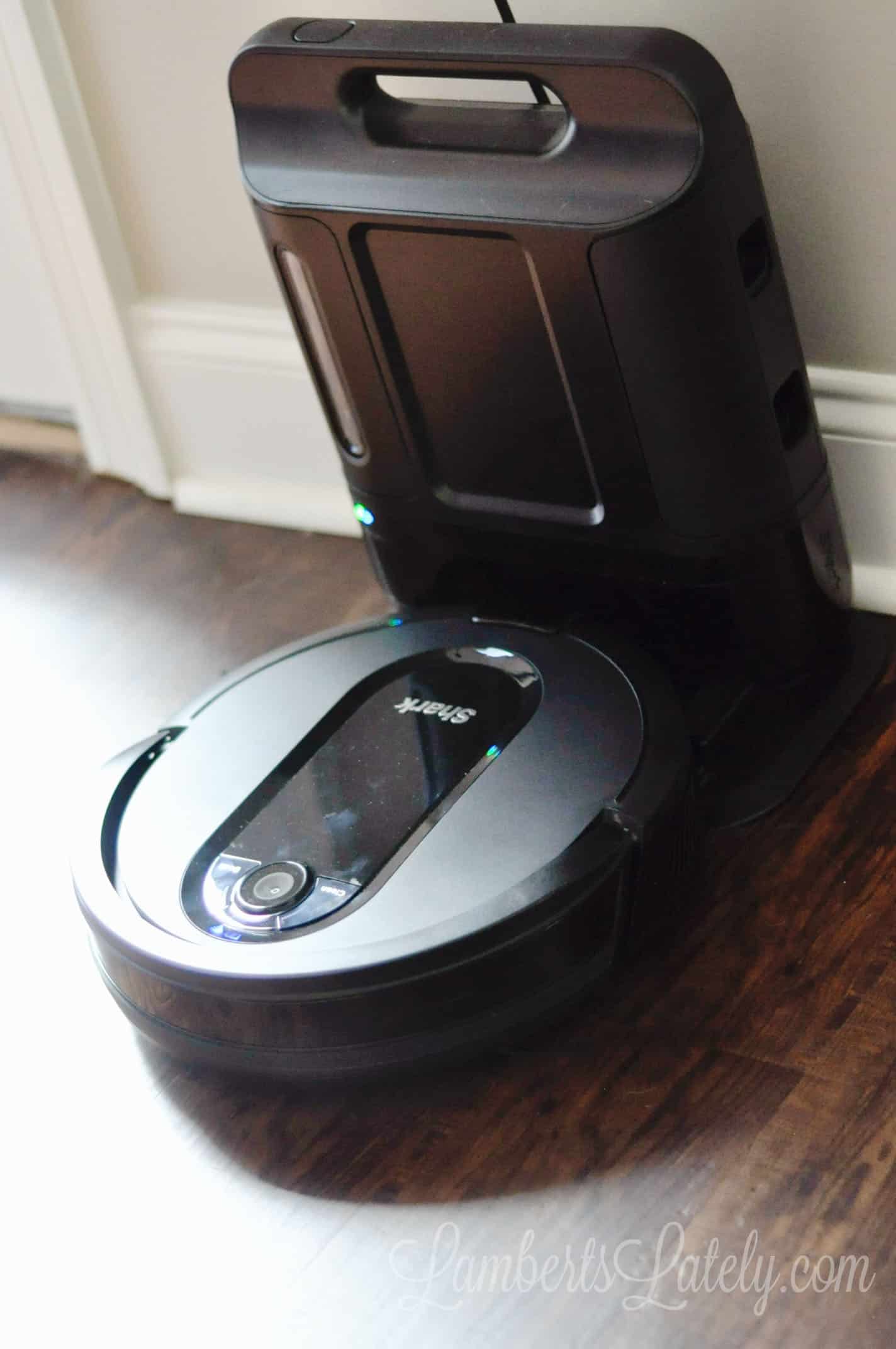 shark robot vacuum on a lvp floor.