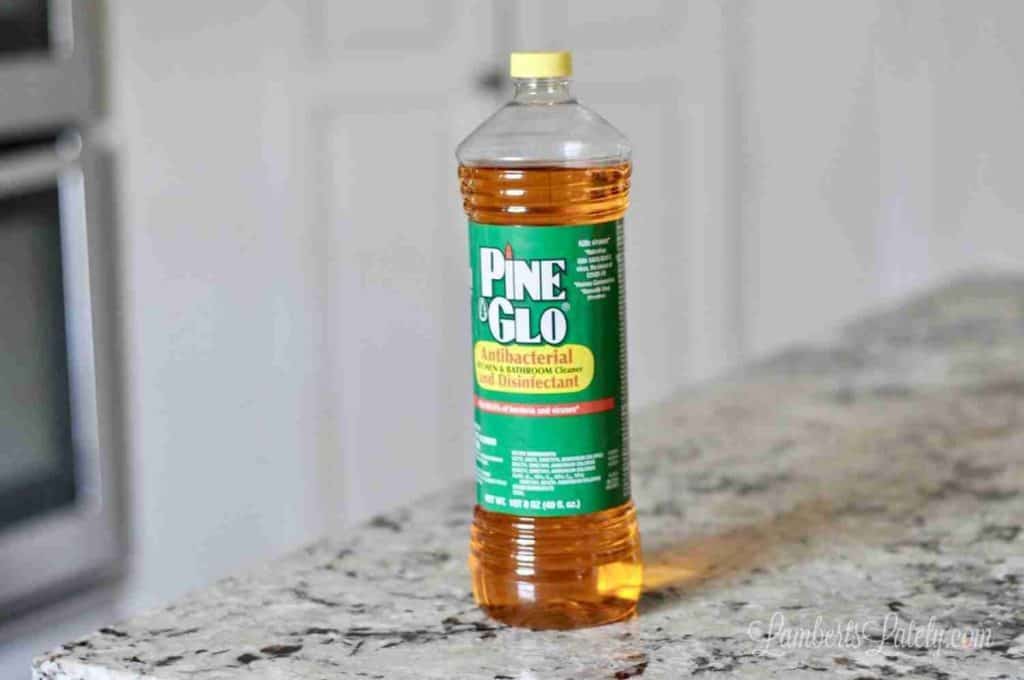 bottle of pine sol on a counter.