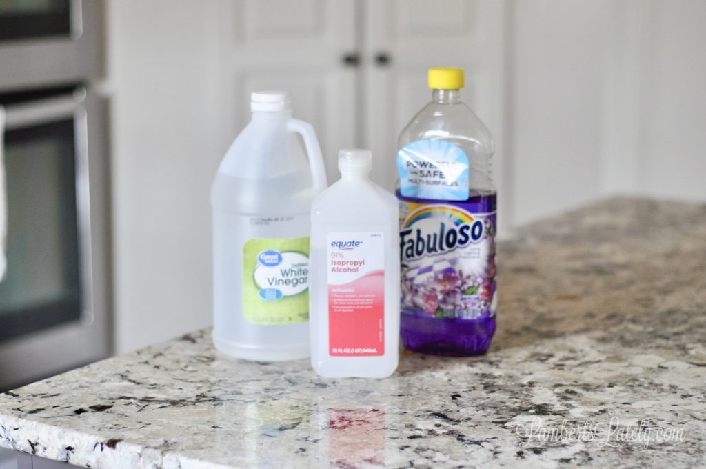 bottles of fabuloso, vinegar, and rubbing alcohol