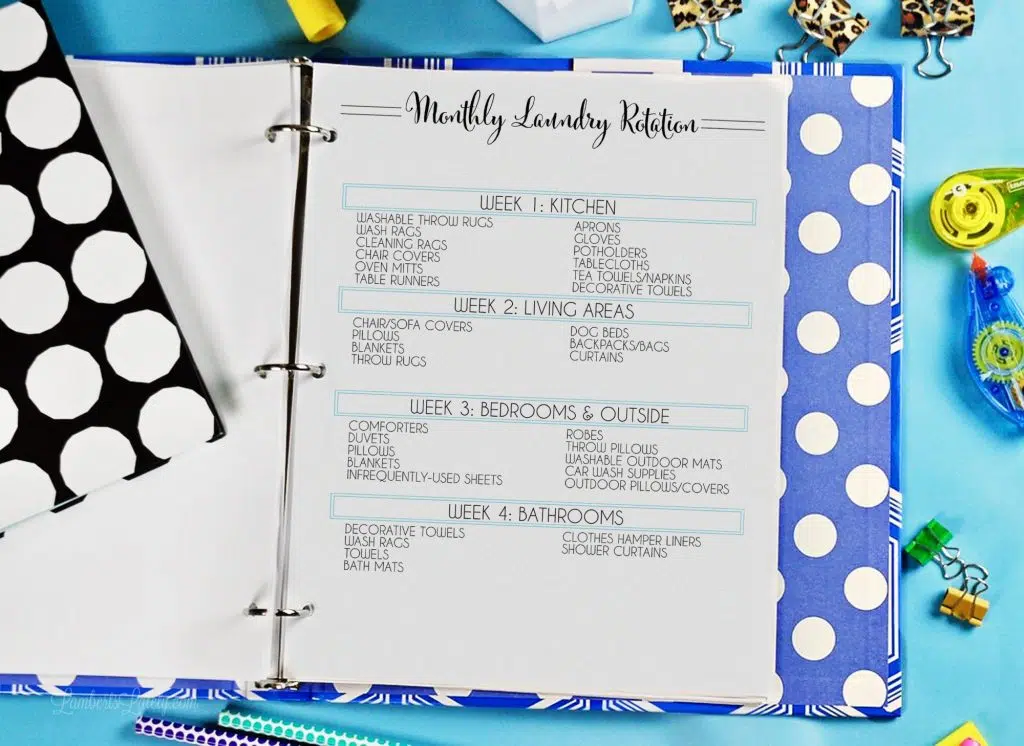 monthly laundry rotation printable in a notebook.