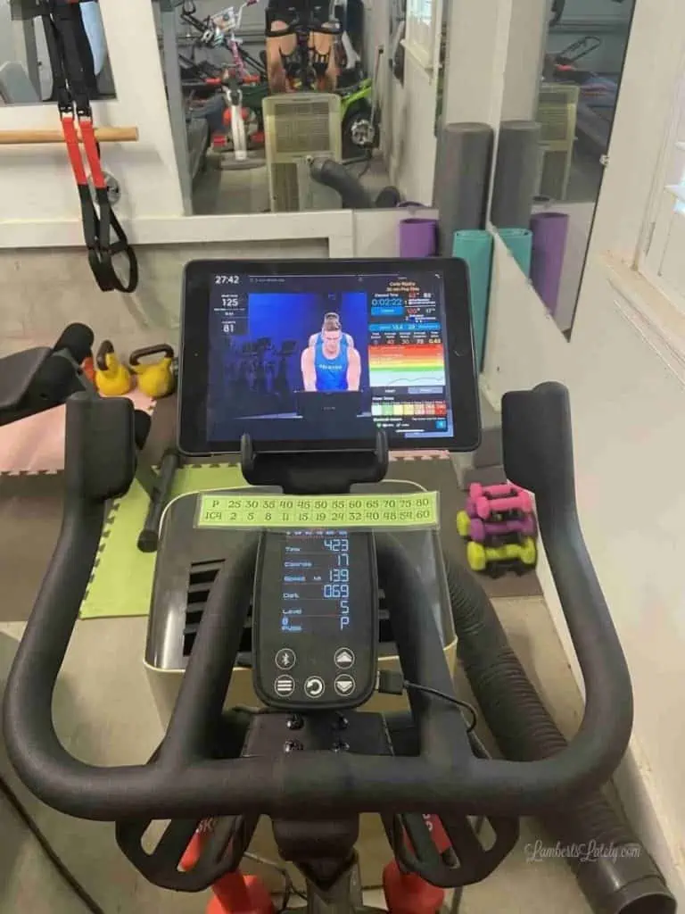 Ipad on a Schwinn IC4 with Peloton app opened.