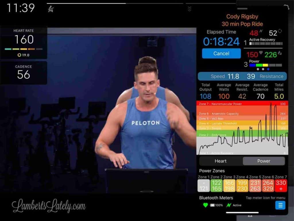 Mpaceline and Peloton apps opened on an iPad.