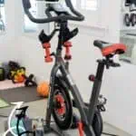 DIY Peloton setup with Schwinn IC4 indoor cycling bike in home gym.