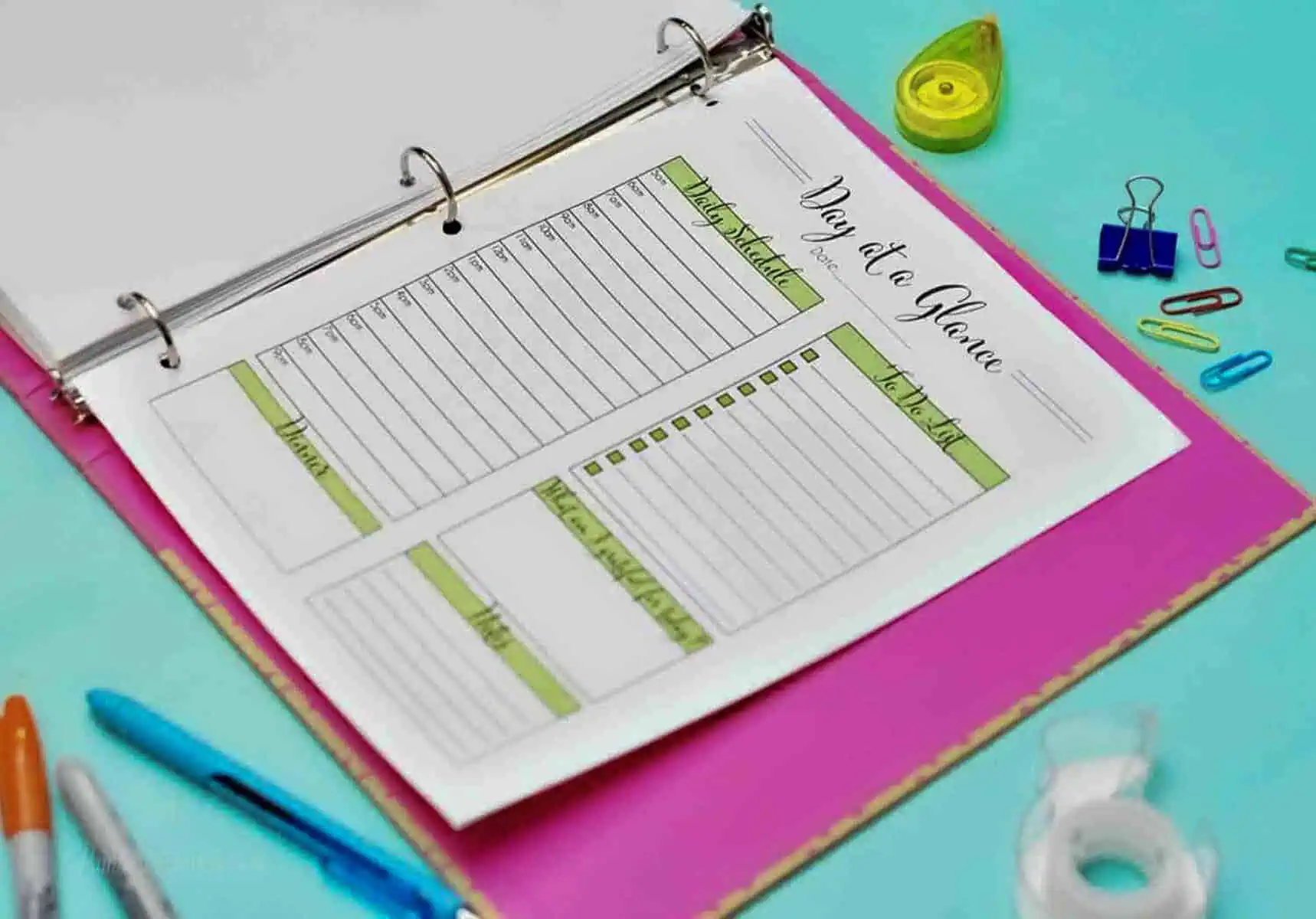 day at a glance printable in a notebook.