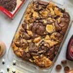 Homemade Reese's Peanut Butter Cup Cake with chocolate and peanut butter toppings.