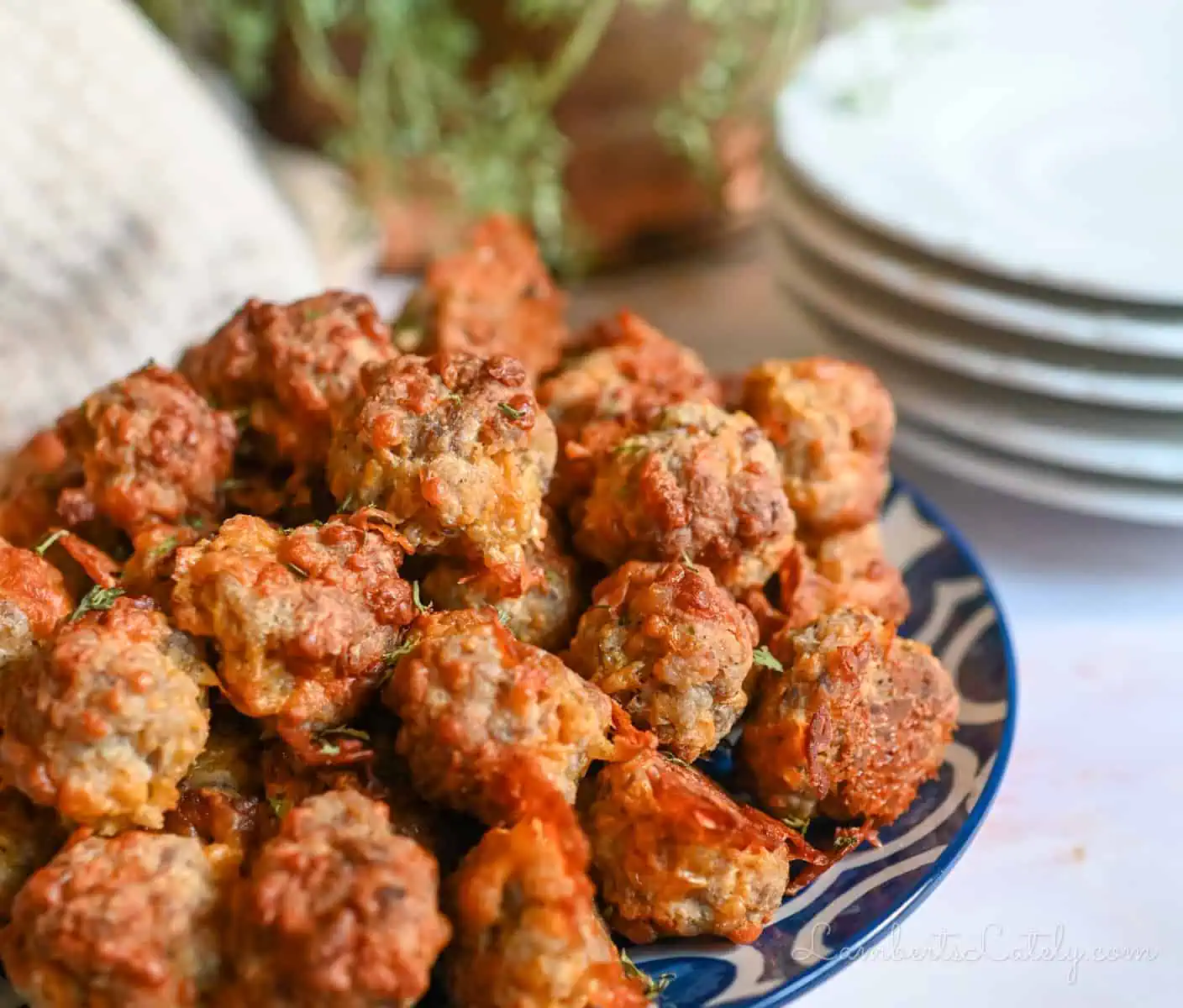 sausage balls on a plate.