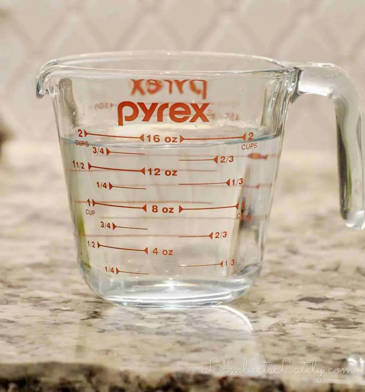 water in a pyrex measuring cup.