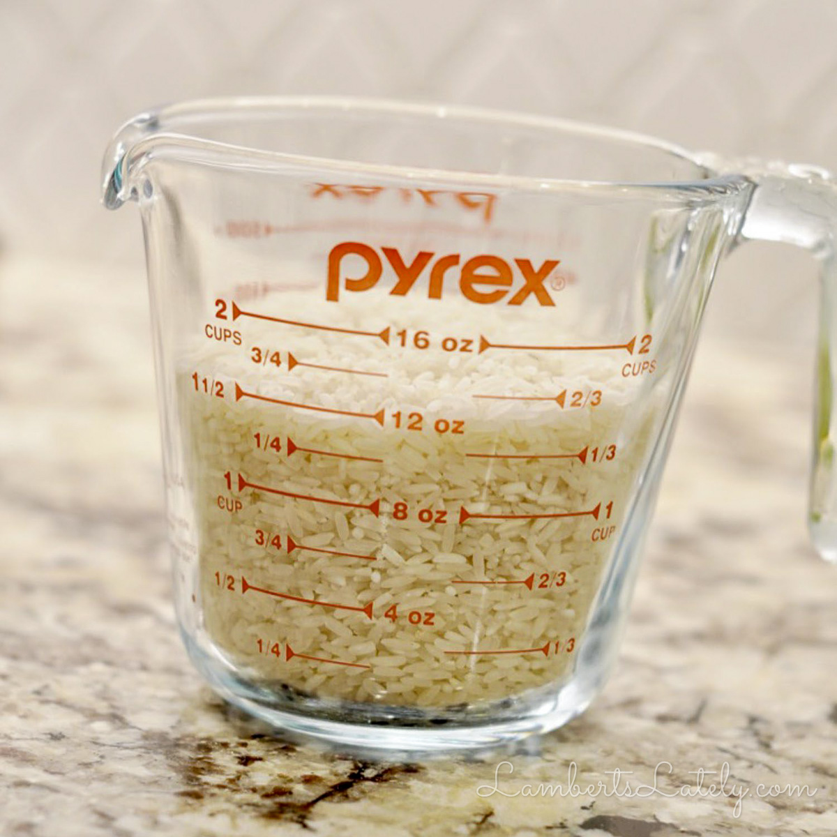white rice in a pyrex measuring cup.