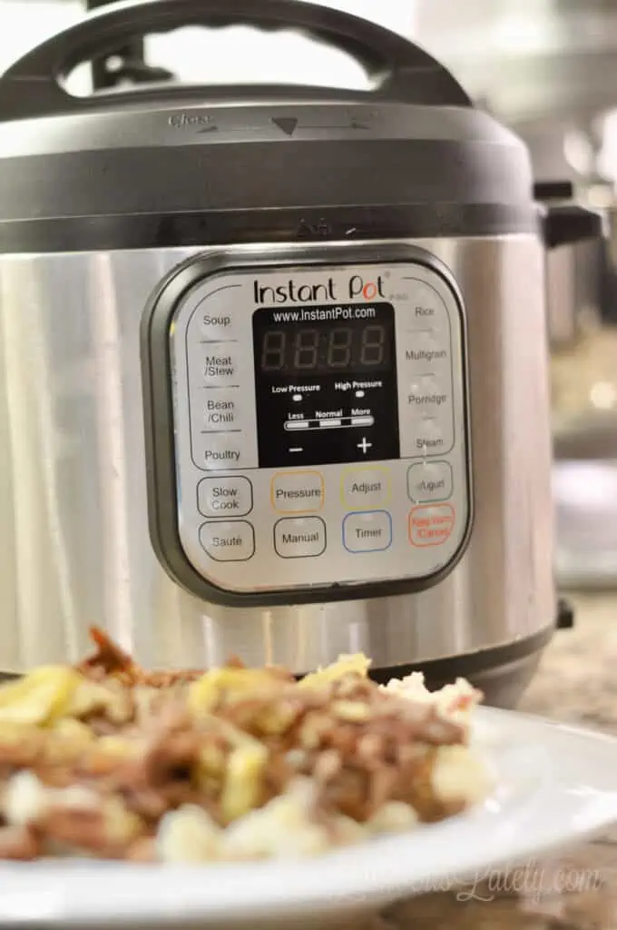 Instant Pot Mississippi Pot Roast in front of the instant pot.