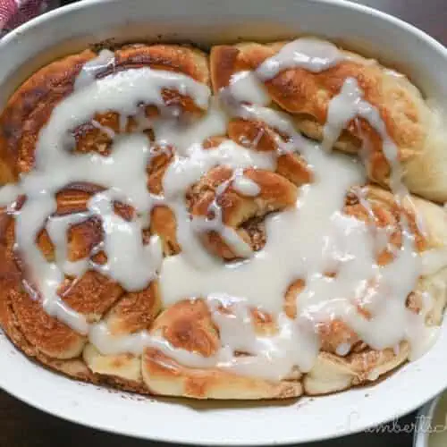 cinnamon rolls drizzled with cream cheese frosting.