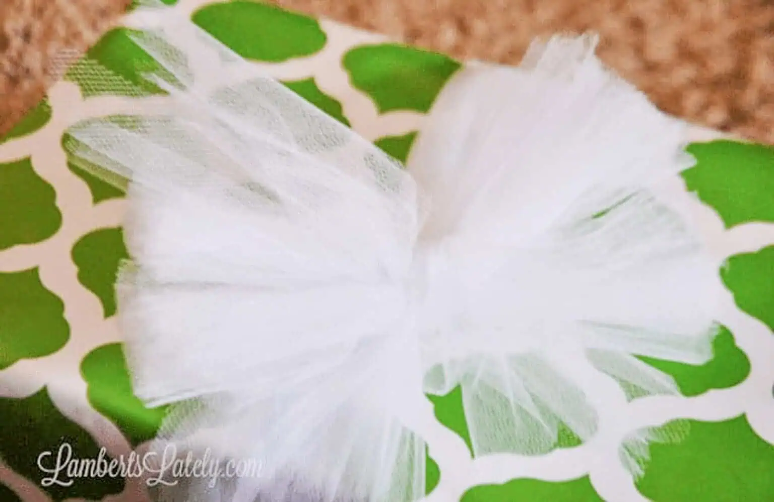 unfluffed tulle bow on a present.