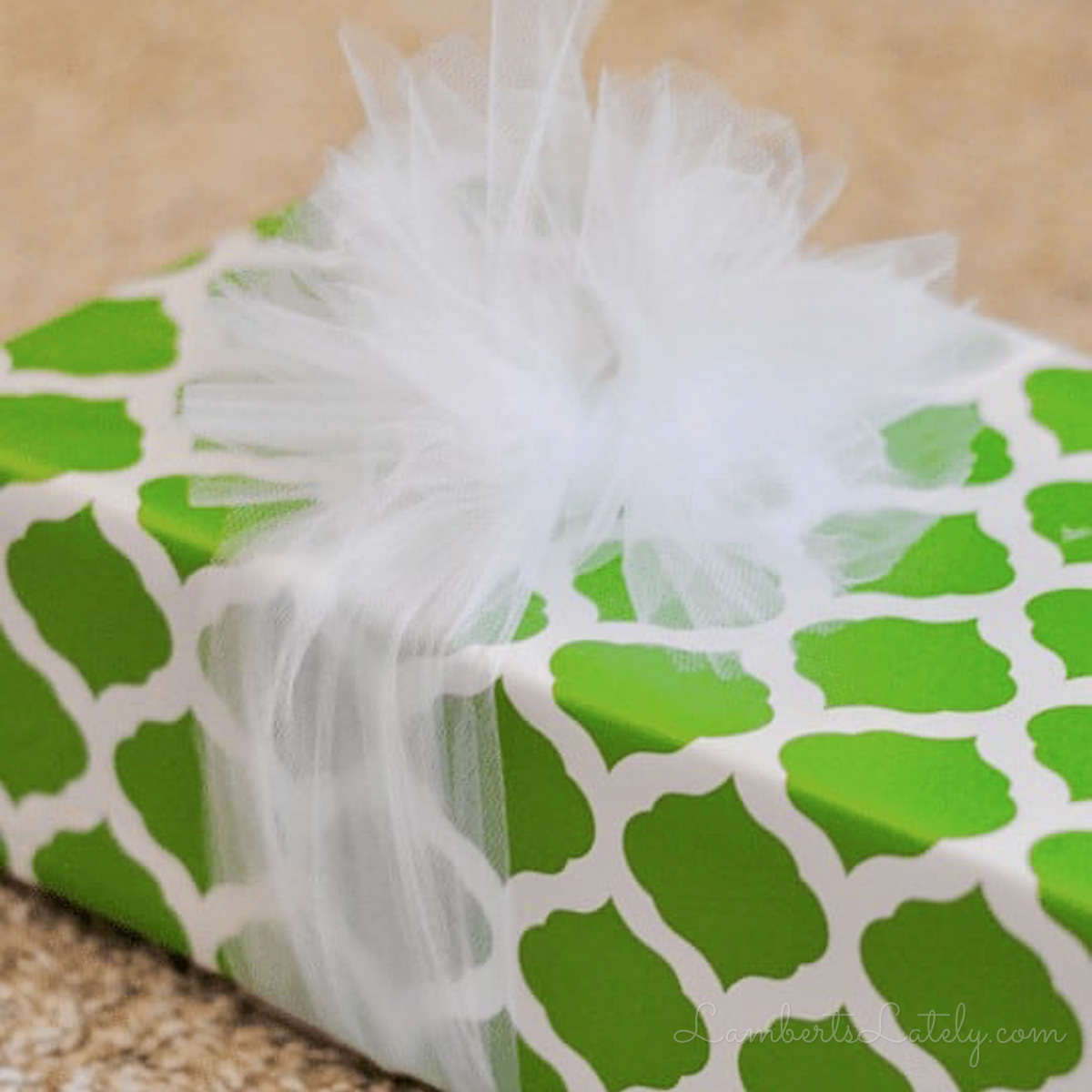 tied tulle bow on a wrapped gift.