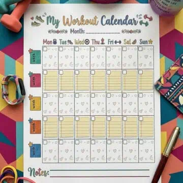 colorful workout calendar on a colorful desk, surrounded by colorful workout gear.