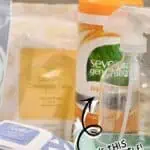 Grove Collaborative cleaning products including spray bottle and detergent.