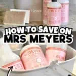 Mrs. Meyer's cleaning products with a gray storage bin and sponge for eco-friendly cleaning.