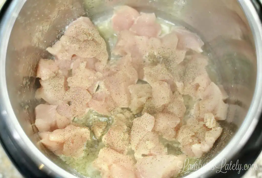 chicken browning in butter in an instant pot.