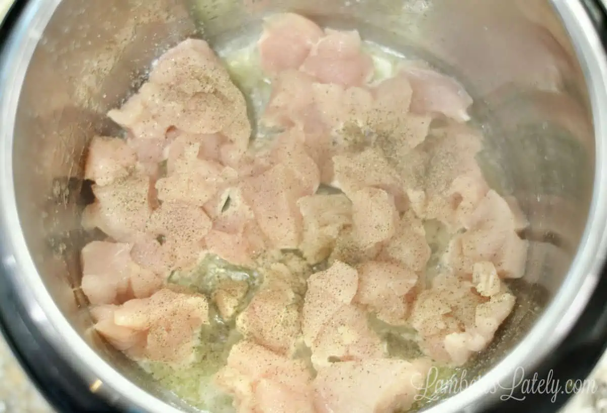 chicken browning in butter in an instant pot.