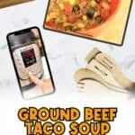 Ground beef taco soup in an instant pot with a tablet showing the dish.